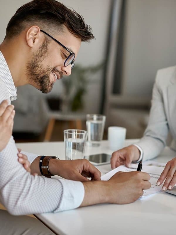Web developer working at computer in Torrevieja office